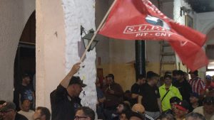 asamblea-trabajadores-tcp-conflicto-puerto